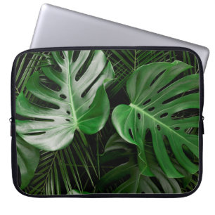Groene monstera-bladeren en palmbladeren laptop sleeve