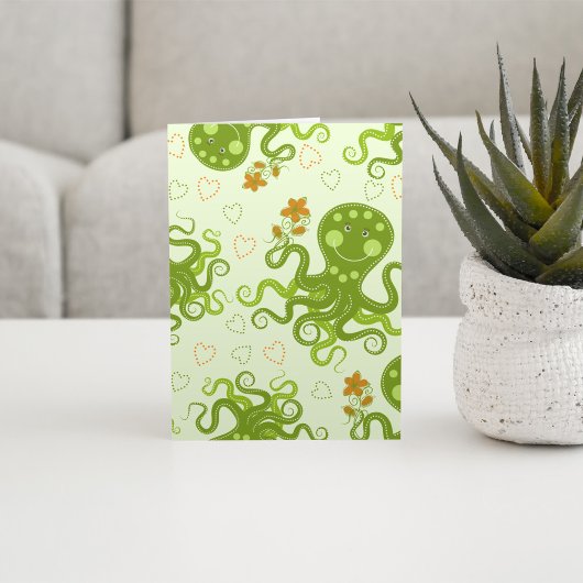 Groene octopussen met bloemen kaart