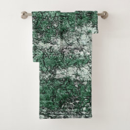 Groene oliestextuur op stokken en pluis bad handdoek