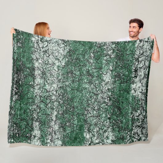 Groene oliestextuur op stokken en pluis fleece deken (In situ)