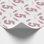 Groene olievloeistof op groen cadeaupapier (Hoek)