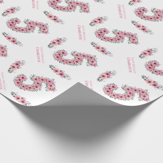 Groene olievloeistof op groen cadeaupapier (Hoek)