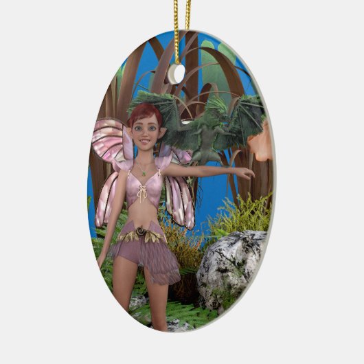 Groene pixeldraak op de arm van Avery Keramisch Ornament (Links)