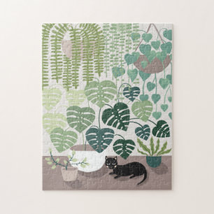 Groene planten, monstera en zwarte kunstpuzzel legpuzzel