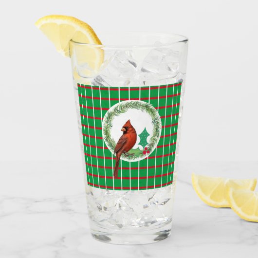 Groene pleinen met een rood en wit glazen bekertje (Voorkant ijs)