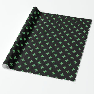 Groene polka kruist zwart cadeaupapier