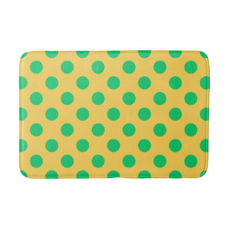 Groene polka-stippen op geel badmat