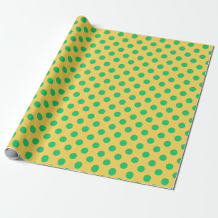 Groene polka-stippen op geel cadeaupapier