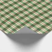 Groene rode, met kerstmis bedekte cadeautjes cadeaupapier (Hoek)