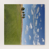 Groene rolheuvels met blauwe hemel boven Natuur Legpuzzel (Horizontaal)