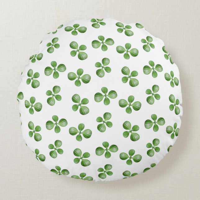 Groene sappige bladeren op wit rond kussen (Voorkant)