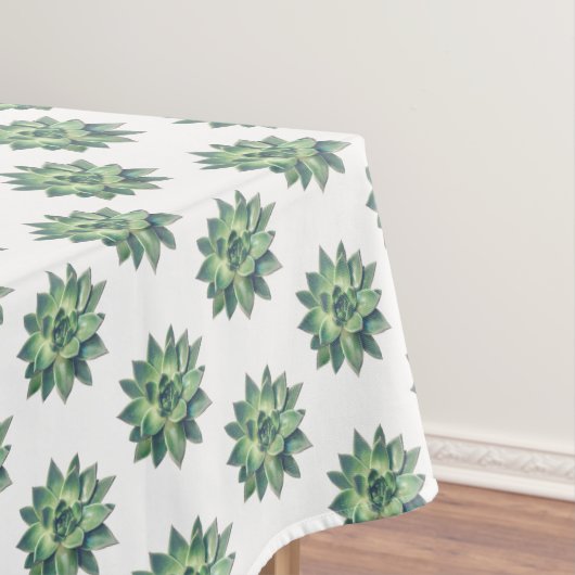 Groene sappige planten op wit tafelkleed (Voorbeeld)