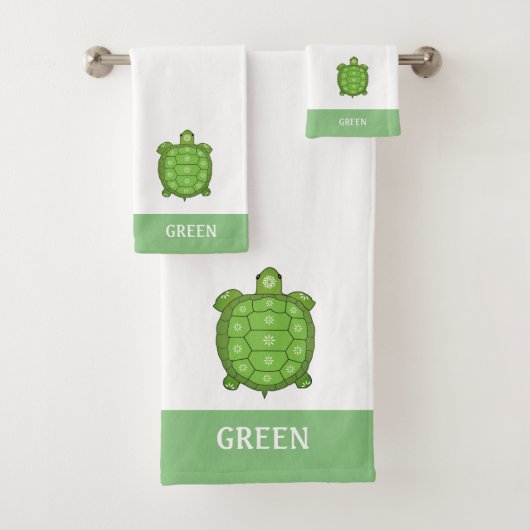 Groene schildpad op witte en limoengroene badhandd bad handdoek (Insitu)