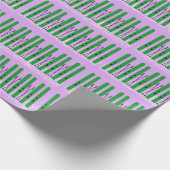 Groene ski's op paarse achtergrond inpakpapier. cadeaupapier (Hoek)