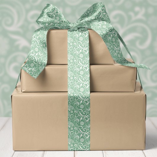 Groene sneeuwvlokken en kerstswirls satijnen lint