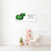 Groene sportwagen met luchtfolie spandoek (Insitu)