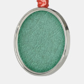Groene steenscheuren metalen ornament (Links)