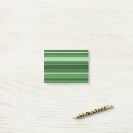 Groene strepen post-it® notes (Op bureau)