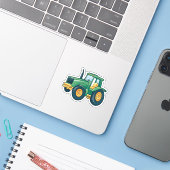 Groene Tractor Cartoon Sticker (Laptop met iPhone)