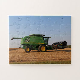 Groene trekker die een veldjumbo oogst legpuzzel