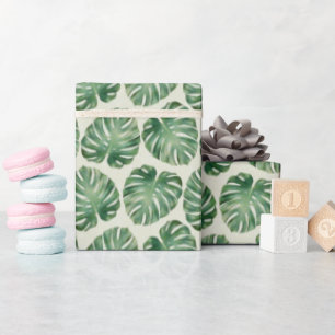 Groene tropische monstera laat een patroon achter cadeaupapier