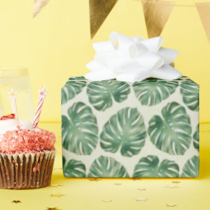 Groene tropische monstera laat een patroon achter cadeaupapier