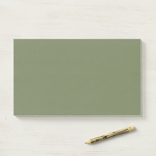 Groene, vaste kleur post-it® notes (Op bureau)