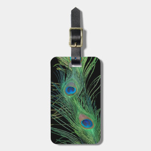 Groene veren met zwart bagagelabel