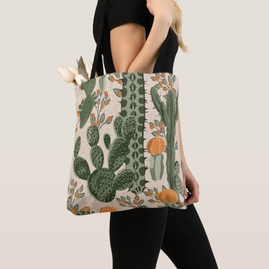 Groene vetplanten, oranje bloemen, strandbehang. tote bag (Dichtbij)