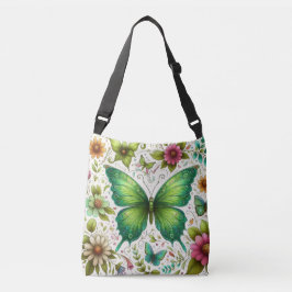Groene vlinder omringd door bloemen crossbody tas