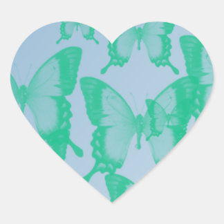 groene vlinders op blauwe achtergrond hart sticker