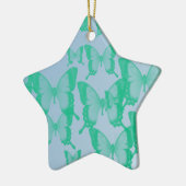 groene vlinders op blauwe achtergrond keramisch ornament (Links)