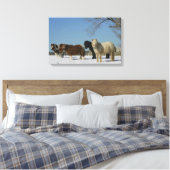 Groep minipaarden in de sneeuw canvas afdruk (Insitu (Slaapkamer))