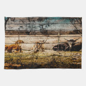 Groep van Longhorns die in Gebied Noodlijdend Hout Theedoek (Horizontaal)