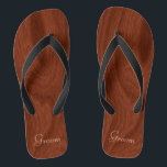 Groom Wedding Day Rustic Wood Kijk naar elke huwel Teenslippers<br><div class="desc">Rustisch hout ziet er groom uit als zandsteen teenslippers perfect voor strandwendels - Leest Groom in elegant, pastelbekistering onderaan. Elegant, rijk mahogany houthopkorrel patroon ziet er achtergrond uit. Opmerking: Hout is bedrukt afbeelding. Rustige trouwfeesten voor leden van de bruidspartij. Verander gewoon tekst sjablonen om je eigen gepersonaliseerde trouwfeest teenslippers te...</div>