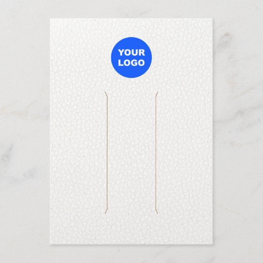 Groot beeldscherm met witte lederen haarklemmen vo informatiekaartje (Voorkant)