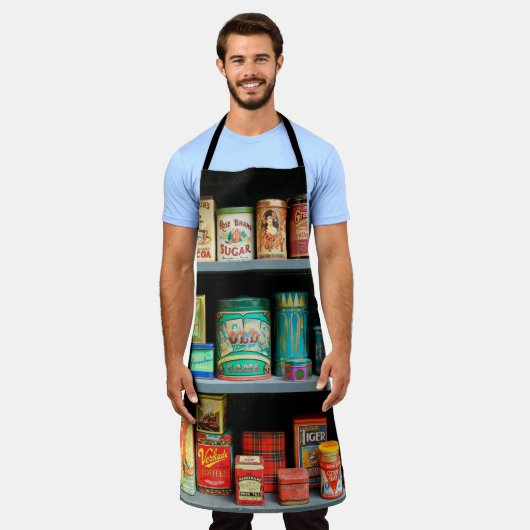 Groot collectie kleurrijke  blikken met display schort (Gedragen)