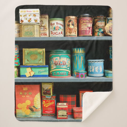 Groot collectie kleurrijke  blikken met display sherpa deken (Voorkant)