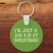 Groot Kind bij kersttshirts en cadeautjes Sleutelhanger (Voorkant)