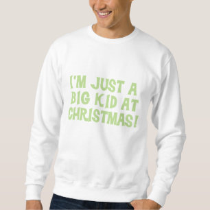Groot Kind bij kersttshirts en cadeautjes Trui