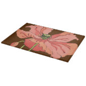 Groot roze ventiel met diepe rode achtergrond snijplank (Hoek)