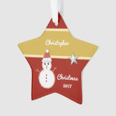 Grootkind met kerstrood en gouden sneeuw ornament (voorkant)