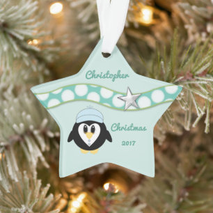 Grootzoon met kerstpinguïn ornament