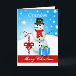 Grootzoon/pretkerst - Snowman Feestdagen Kaart<br><div class="desc">Verstuur je liefhebbende wensen dit vakantieseizoen naar je kleinzoon in dit zoete wenskaart, dat is voorzien van een Happy Snowman in een bovenste hoed en een rode sjaal, een snoepriet in rood en wit en een blauw geschenk. U kunt het innerlijke versum gebruiken of eigen sentimenten toevoegen. ©SmudgeArt - Madeline...</div>