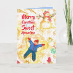 Grootzoon Snowman Angels Winter Kaart<br><div class="desc">Vrolijk kerstcadeautjes voor een zoete kleinzoon,  versierd met een jonge jongen die sneeuwengelen maakt met een glimlachende sneeuwpop en sneeuw die met waterverf vallen. Er zit een schaduw van warm blauw aan de binnenkant.  U kunt de binnenkleur en de tekst aan uw behoeften aanpassen.</div>