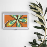 Groovy 60s 70s Hippie Flower Sinaasappel Retro Dai Visitekaarthouder<br><div class="desc">Dit oranje, retro ontwerp biedt een caleidoscoop van warme, aardse tinten die de essentie van de jaren '60 en '70 belichamen, en nodigt je uit naar de wereld die niets minder is dan groovy. Het heeft een hypnotisch, op bloemen geïnspireerd motief dat naar buiten uitstraalt in een oogverblindende vertoning van...</div>