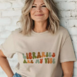 Groovy retro bibliotheken zijn mijn vibe, biblioth Tri-Blend shirt<br><div class="desc">Retro-stijl 'Libraries Are My Vibe' T-shirt,  voor bibliothecarissen,  archivarissen en bibliotheekassistenten.</div>