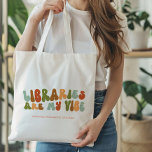 Groovy retro bibliotheken zijn mijn vibe, boek bib tote bag<br><div class="desc">Groovy,  jaren 1970-stijl retro 'Libraries Are My Vibe' tas voor bibliothecarissen of iedereen die van de bibliotheek houdt.</div>