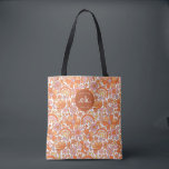 Groovy Retro Oranje Bloemen Monogram Tote Bag<br><div class="desc">De Groovy Retro Oranje Bloemen Monogram Tote Bag is een stijlvolle en functionele accessoire die perfect is voor elke gelegenheid. Met zijn opvallende oranje bloemenpatroon en gepersonaliseerde monogram voegt deze tote een levendige kleur toe aan je garderobe. Ruim genoeg om al je benodigdheden mee te nemen, of je nu naar...</div>