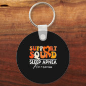 Groovy Support Squad Oranje Lint Slaapapneu Awa Sleutelhanger (Voorkant)
